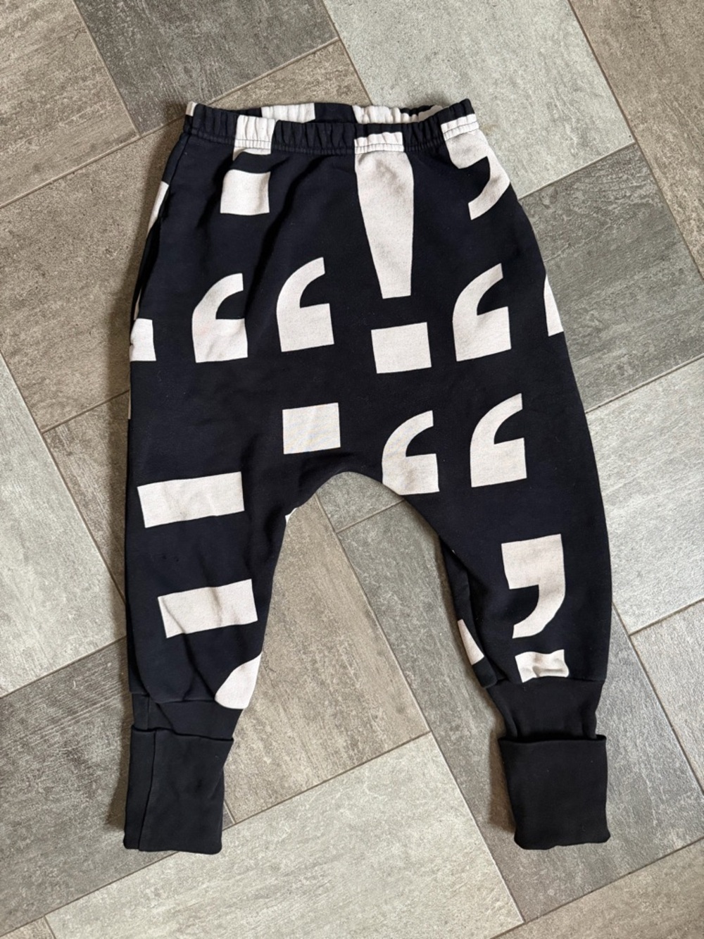 nununu Black Harem Joggers with cream Graphic Print | adjustable cuffs